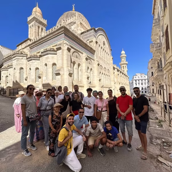 a group of tourists with the guide